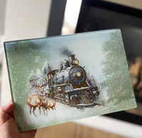 All aboard the Christmas train glass chopping board